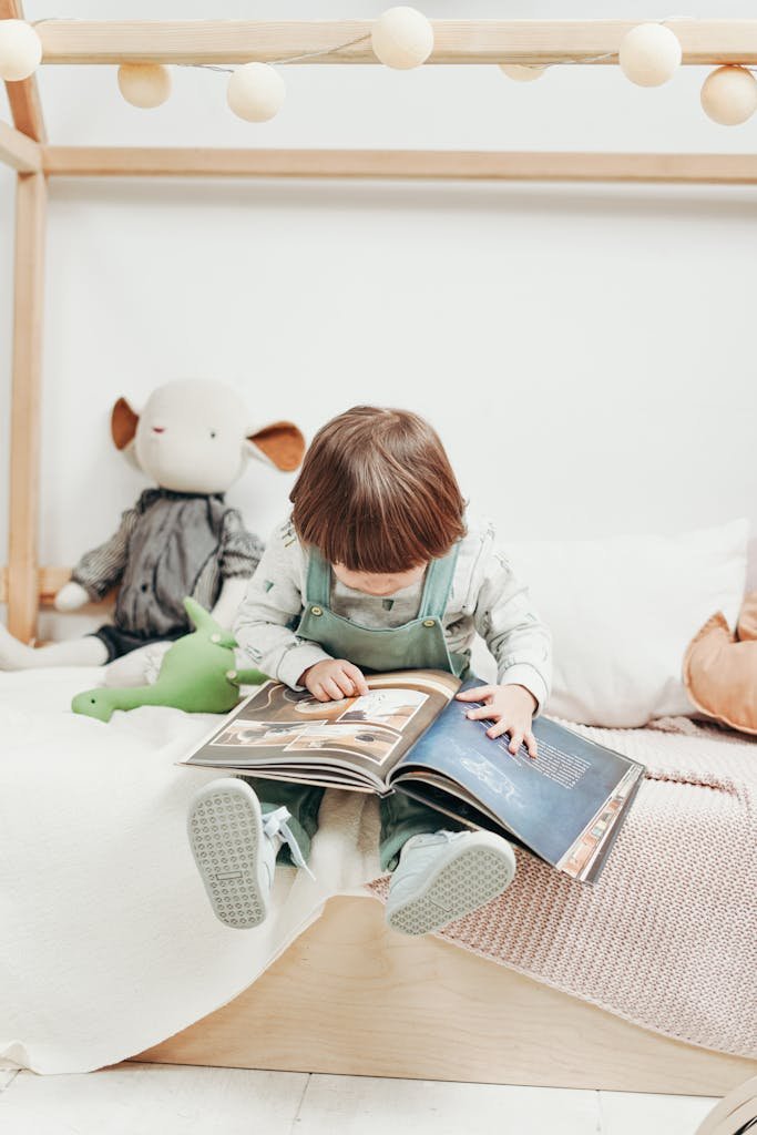 Adorable child reading a book in a cozy playroom, surrounded by toys. Perfect for early learning themes.